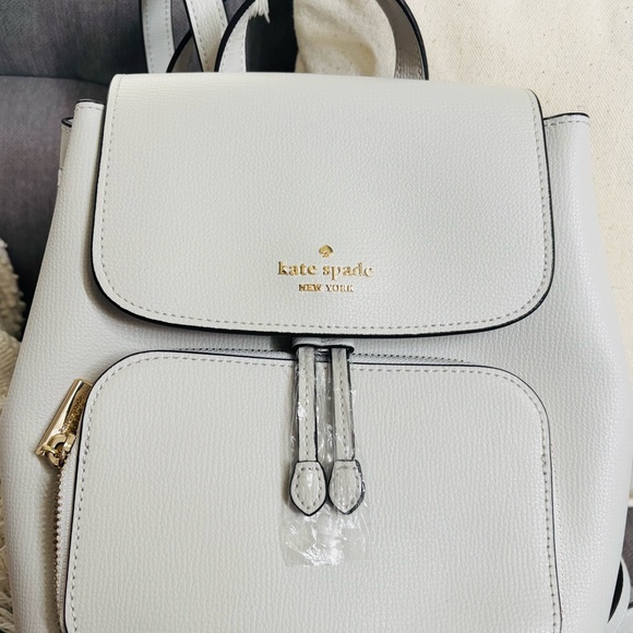 kate spade Handbags - Kate Spade Gray Backpack with Structured Design and Gold Accents